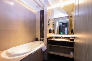 Koupelna v ubytování FUGO Hotel Banjarmasin