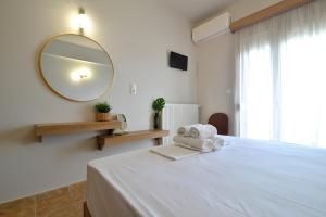 Hotel Akti客房内的一张或多张床位