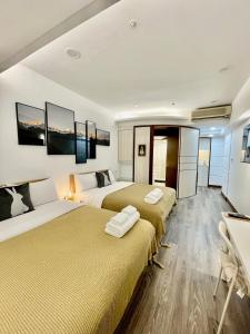 TV a/nebo společenská místnost v ubytování 所在行旅2館-渡咕所在 UrbanAbode2-DUGU