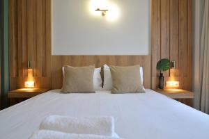 Hotel Akti客房内的一张或多张床位