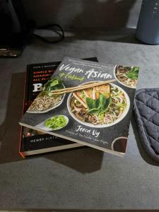 a book sitting on top of a table at Careful Cottage in Crediton +17 photos