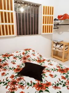 Postel nebo postele na pokoji v ubytování Mini Recanto da Rosalina