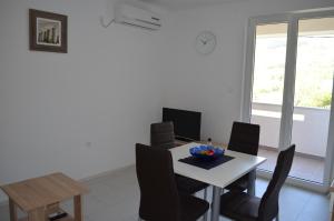 TV a/nebo společenská místnost v ubytování Apartments Marija