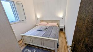 Postel nebo postele na pokoji v ubytování Paradies Apartments Prizba