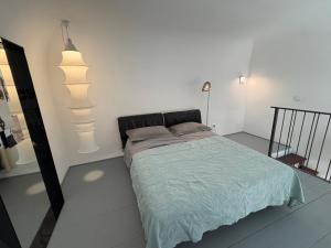 Postel nebo postele na pokoji v ubytování Lumiae Suite