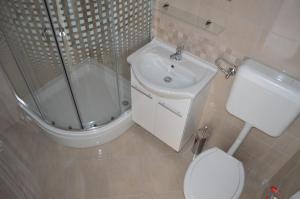 Koupelna v ubytování Apartments Marija + 15 fotografií