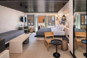 Posezení v ubytování ArmonOia Suites + 37 fotografií