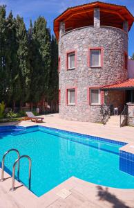 Afbeelding uit fotogalerij van Villa Oasis Taşın Zarafeti,Modern Rahatlık in Dalaman