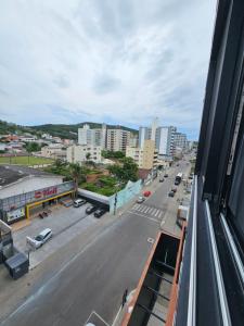 a view of a city street from a building at Luxor residence in Laguna