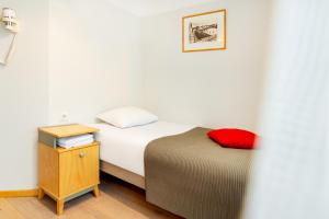 Postel nebo postele na pokoji v ubytování Hotel Tartu