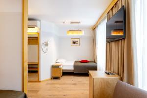 Postel nebo postele na pokoji v ubytování Hotel Tartu