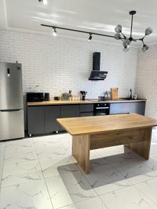 Köök või kööginurk majutusasutuses Rich Home