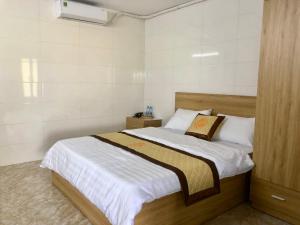 EaPuk Motel客房内的一张或多张床位