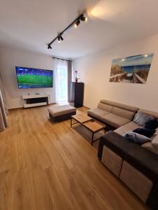 TV a/nebo společenská místnost v ubytování APP MARE Umag