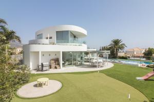 Bazén v ubytování Villa Oasis del Sur nebo v jeho okolí