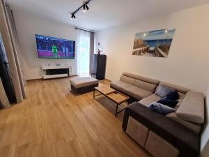 TV a/nebo společenská místnost v ubytování APP MARE Umag