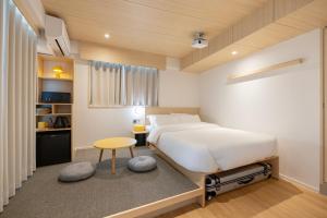 Hotel Marguerite Seoul房間的床