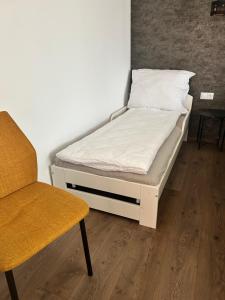 Posteľ alebo postele v izbe v ubytovaní Réz Apartmanok Gyula