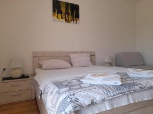 Ένα ή περισσότερα κρεβάτια σε δωμάτιο στο Apartment Milica