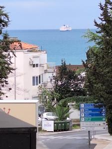 a view of the ocean from a building at Igalo in Igalo