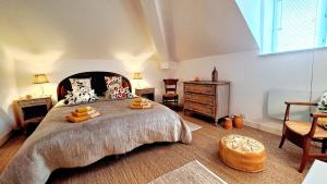 Postel nebo postele na pokoji v ubytování COSY CHAMBRE-SUITE climatisée