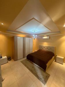 a bedroom with a large bed in a room at Villa DeMar - Coastal luxury in Ulcinj +8 photos