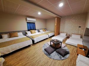Postel nebo postele na pokoji v ubytování 舞浪海景旅店