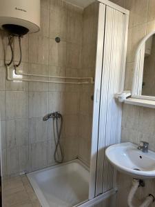 Koupelna v ubytování Apartman Centar BB + 16 fotografií