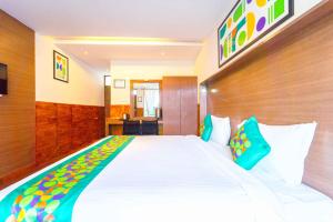 Katil atau katil-katil dalam bilik di Treebo Tranquil Heights With Scenic View