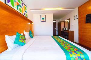 Katil atau katil-katil dalam bilik di Treebo Tranquil Heights With Scenic View
