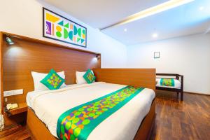 Katil atau katil-katil dalam bilik di Treebo Tranquil Heights With Scenic View
