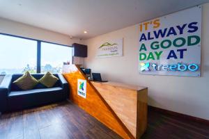 Sijil, anugerah, tanda atau dokumen lain yang dipamerkan di Treebo Tranquil Heights With Scenic View
