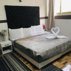 Voodi või voodid majutusasutuse Hotel velvet One toas