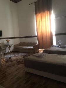 Voodi või voodid majutusasutuse Hotel velvet One toas