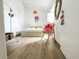 Ένα ή περισσότερα κρεβάτια σε δωμάτιο στο CasaBaixinha- Mina São Domingos-Praia Fluvial-3minutos-Terraço