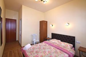 Postel nebo postele na pokoji v ubytování Villa Rosa