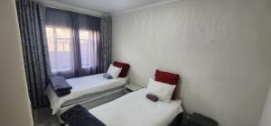 Katil atau katil-katil dalam bilik di Casa línda guest house unit 17