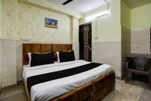 Postel nebo postele na pokoji v ubytování Hotel Vista 18 Inn Couple Friendly