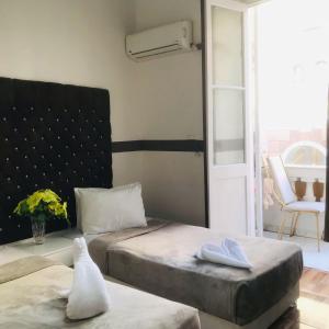 Voodi või voodid majutusasutuse Hotel velvet One toas