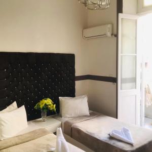 Voodi või voodid majutusasutuse Hotel velvet One toas