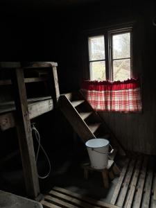 a room with two bunk beds and a window at Country house near services in Vihti
