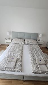Postel nebo postele na pokoji v ubytování Apartment Wien - Favoriten