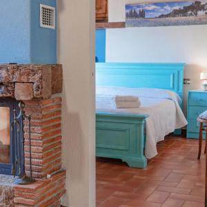 Postel nebo postele na pokoji v ubytování Agriturismo Cafaggio Primo