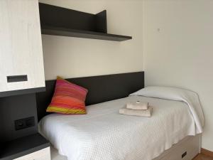 Posteľ alebo postele v izbe v ubytovaní Casita de la playa con parking