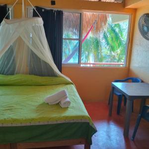 Postel nebo postele na pokoji v ubytování Posada ecohabitas