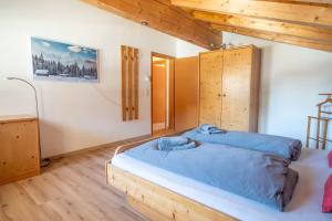 Postel nebo postele na pokoji v ubytování Appartement Alpenliebe