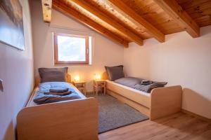 Postel nebo postele na pokoji v ubytování Appartement Alpenliebe