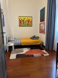 A bed or beds in a room at La casa di Archimede