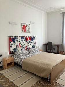 A bed or beds in a room at La casa di Archimede
