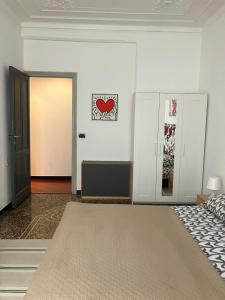 A bed or beds in a room at La casa di Archimede